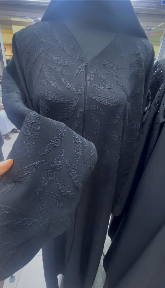 Abbaya bordées plumes